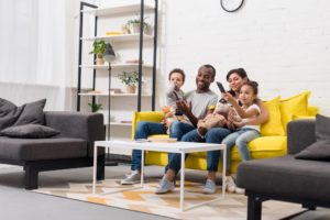 happy people in clean organized living room